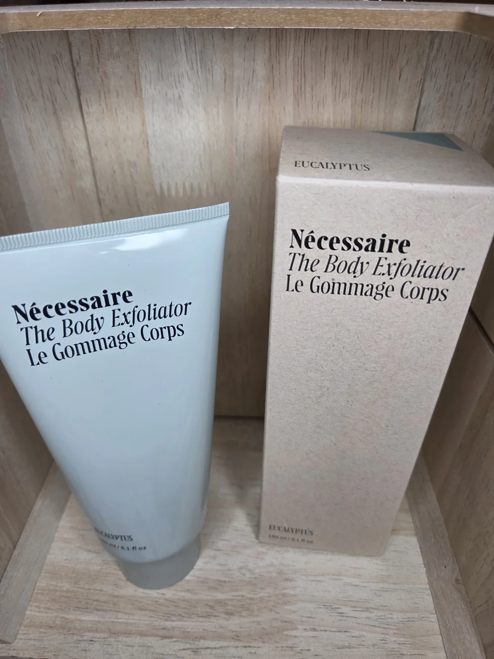 Nécessaire The Body Exfoliator in the Eucalyptus scent (6.1 fl oz / 180 ml).